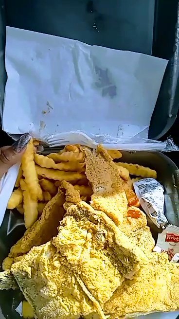 Fried fish baskets on a counter.